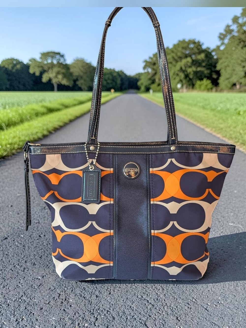 Coach Medium Tote in Navy and Bright Orange Signature C Satin